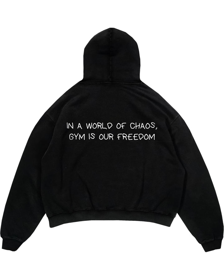 IN A WORLD OF CHAOS, GYM IS OUR FREEDOM Oversized (Backprint) Hoodie